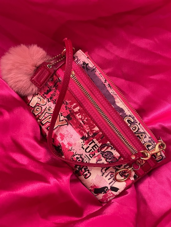 Coach Handbags - Coach Poppy - pink graffiti wristlet w/pom pom & hang tag